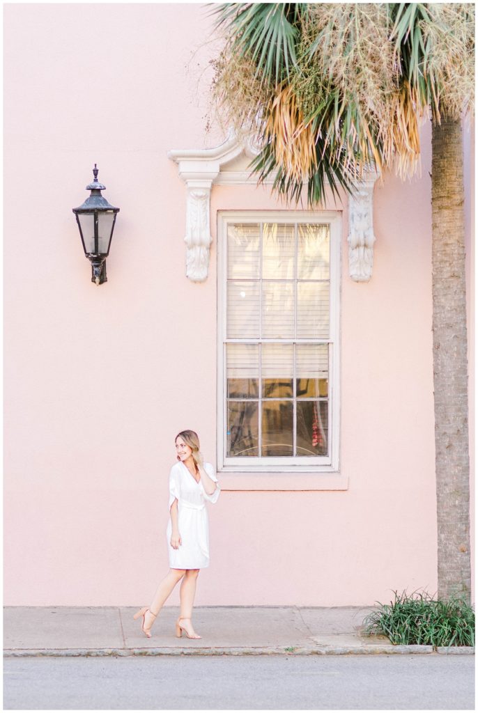 Bride poses in front of The Mills House in Charleston, SC