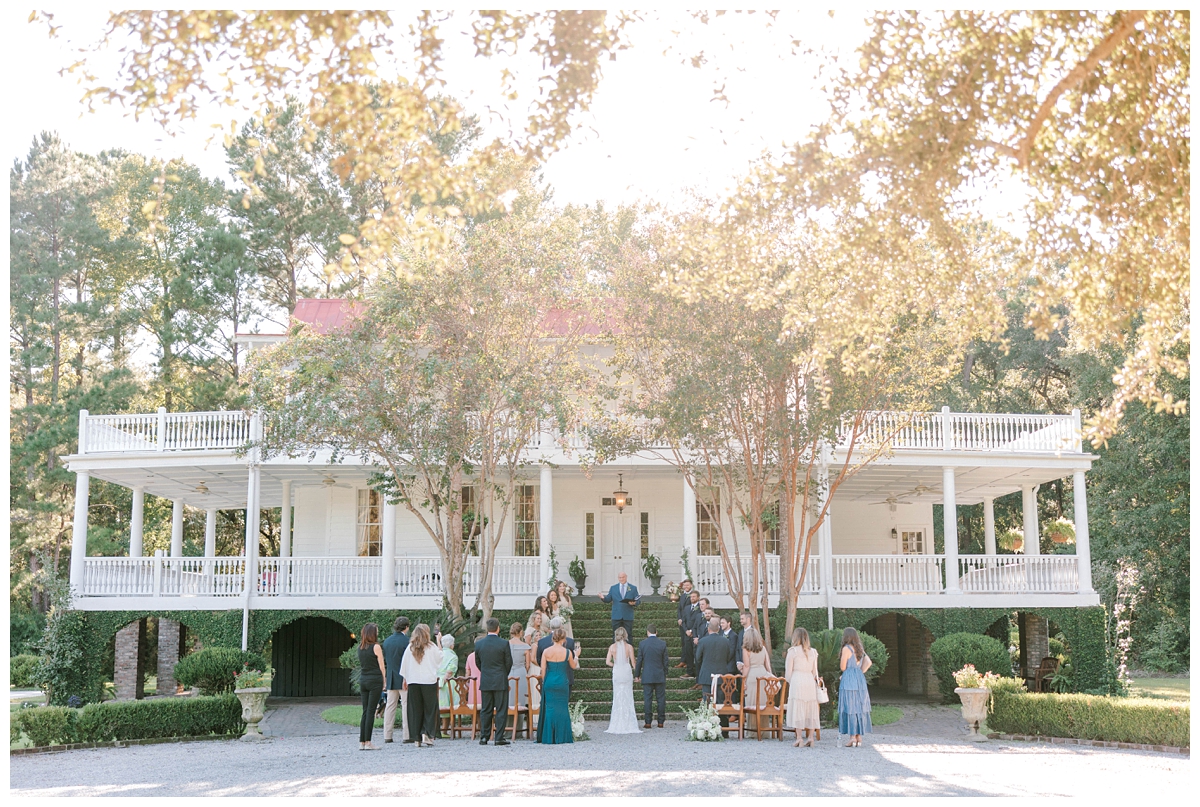 Old Wide Awake microwedding ceremony in front of hotel in Charleston SC