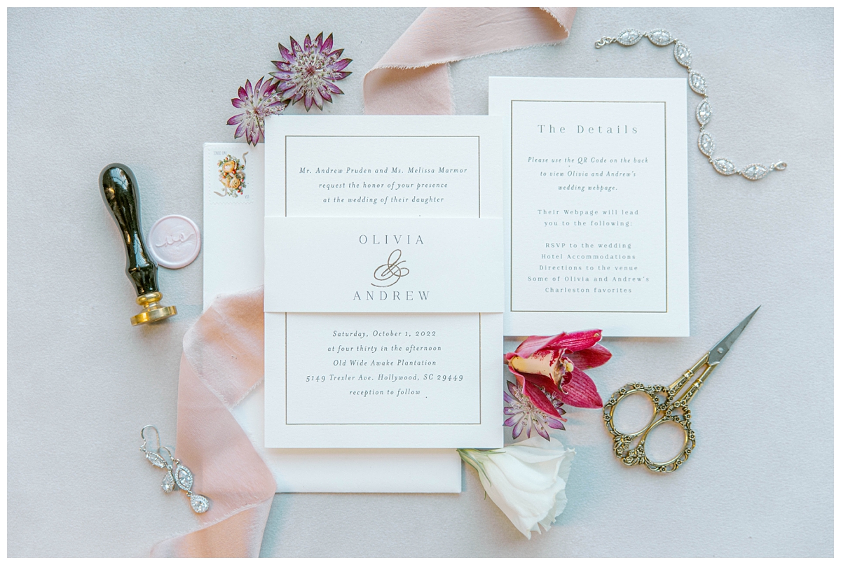 Bridal invitation suite, flowers and bouquet photographed before ceremony in Charleston, SC