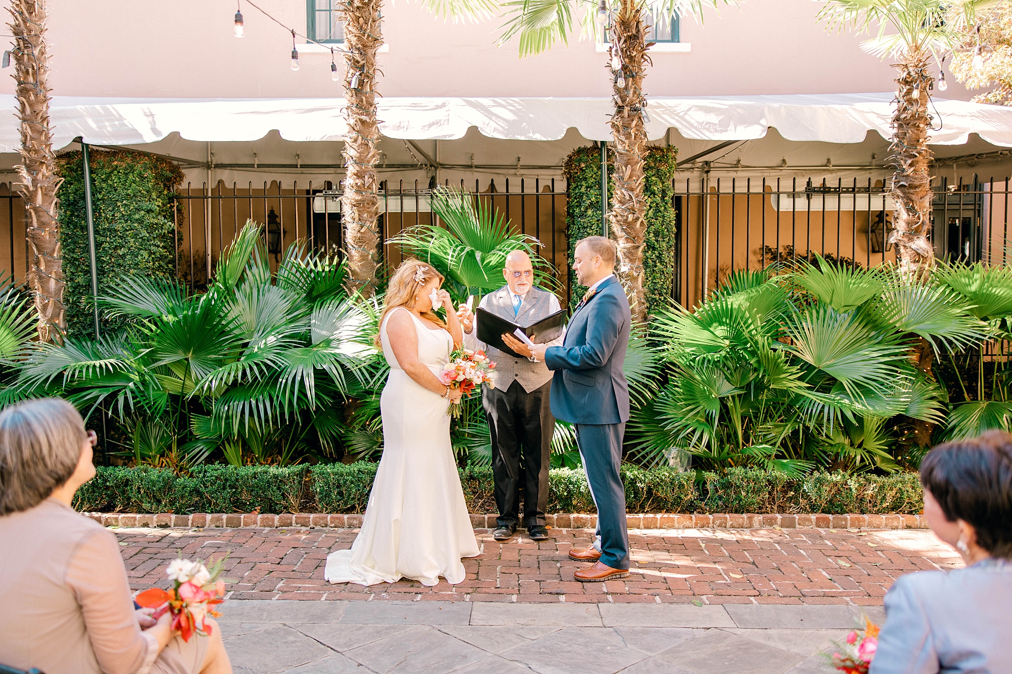 wedding ceremony in the courtyard at Planter's Inn
