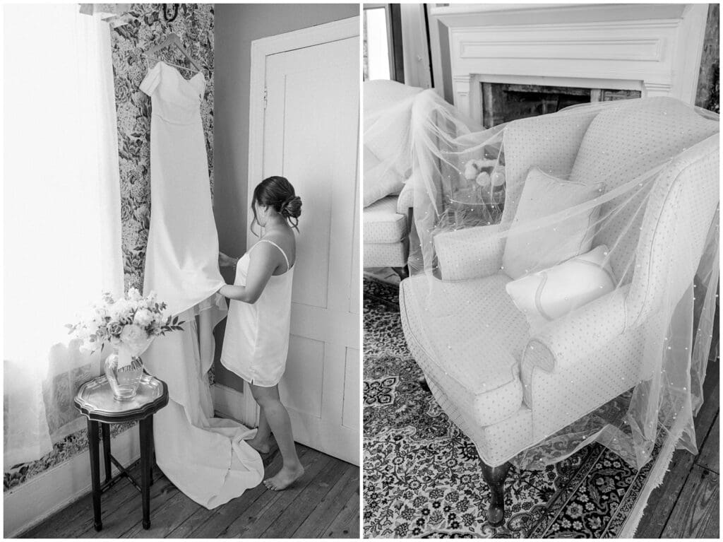 Bride admiring her off-the-shoulder wedding gown hanging against floral wallpaper during summer wedding at Old Wide Awake Plantation in Charleston, South Carolina.
